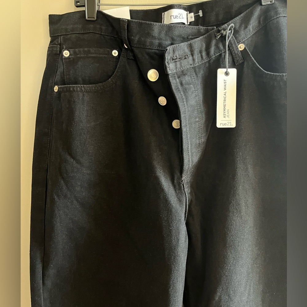Rue 21 Asymmetrical black jeans.